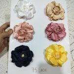 Beaded centre satin flowers