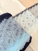 Sky blue roses net with navy cutwork border